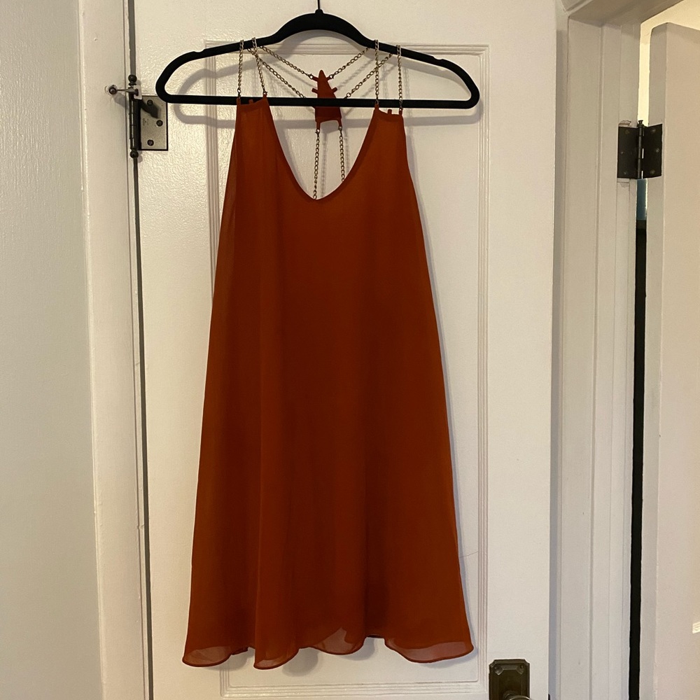 Burnt orange mini dress with chain detail